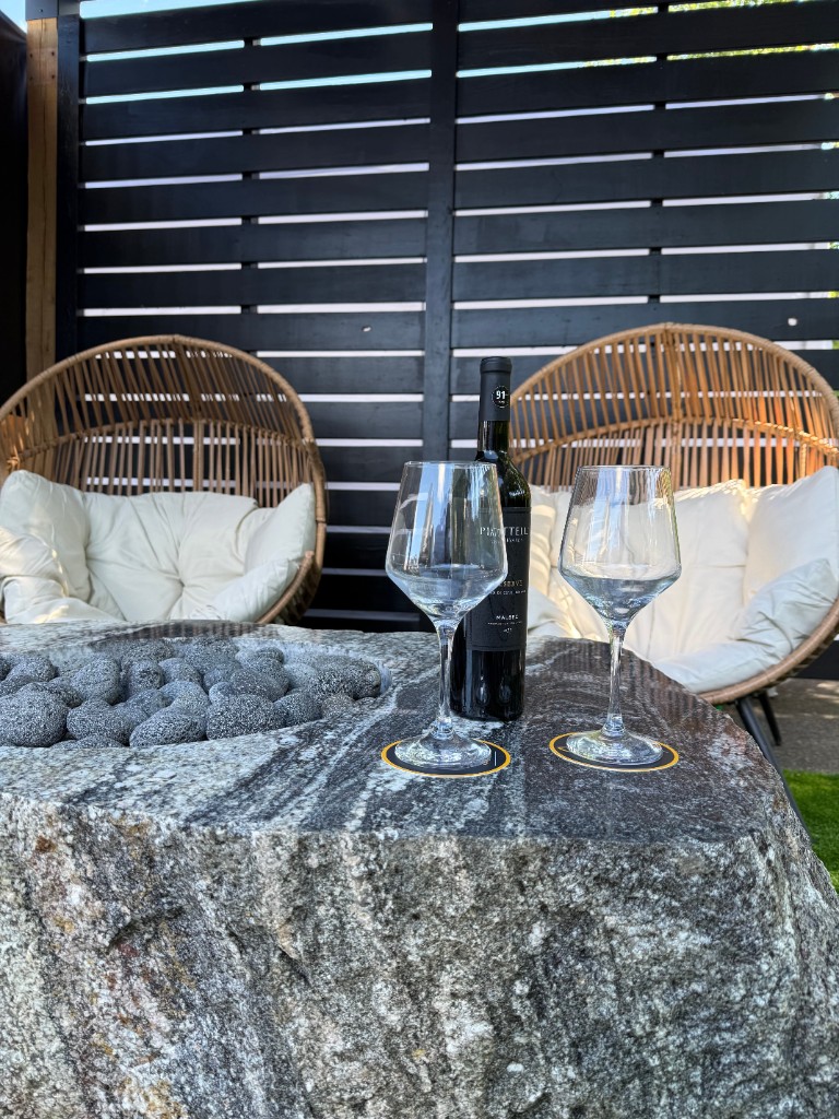 Outdoor living — fire pit table and egg chairs